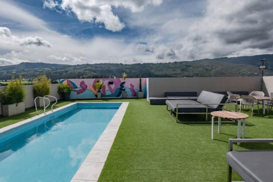 Uma Suites Chía Esterno foto